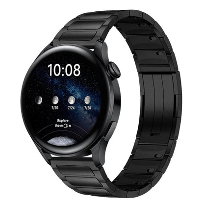 Black stainless steel watch band with linked tri-bead design, shown fitted to a round smartwatch