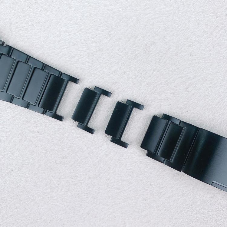 Black stainless steel watch band with removable links separated for adjustment