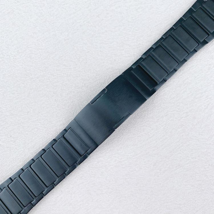 Black stainless steel watch band showing its broad folding clasp and linked design