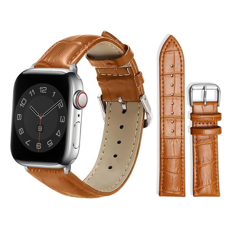 Tan textured leather Apple Watch band with cream stitching and silver pin buckle.