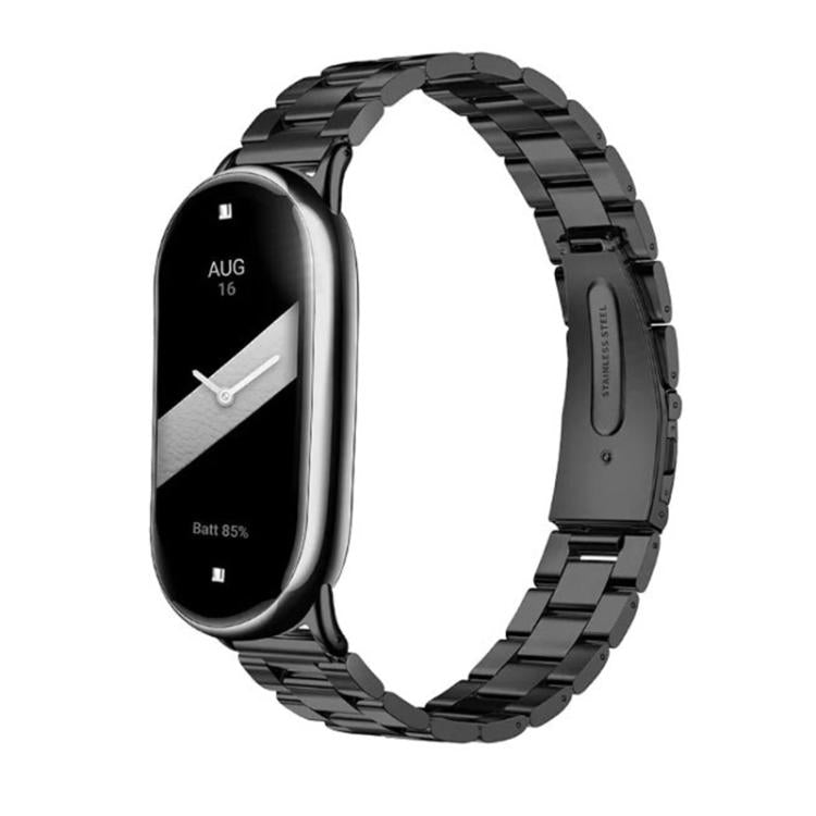 Black titanium alloy watch band with flat links and folding clasp, fitted to a slim smartwatch