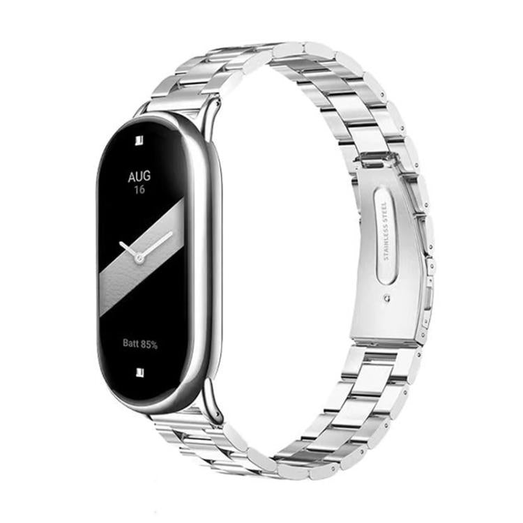 Silver titanium alloy watch band with flat links and folding clasp, fitted to a slim smartwatch
