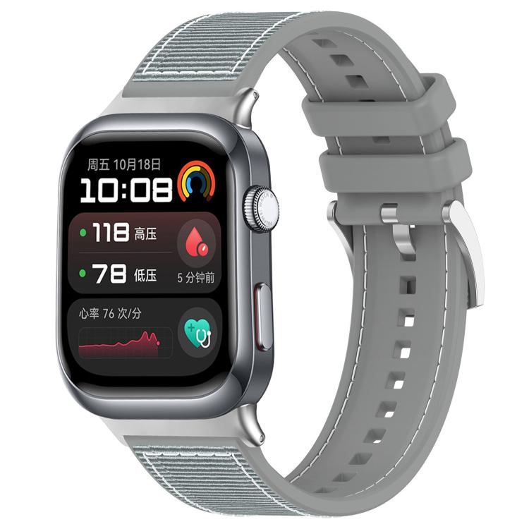 Gray hybrid nylon and silicone watch band fitted to a rounded rectangular smartwatch.