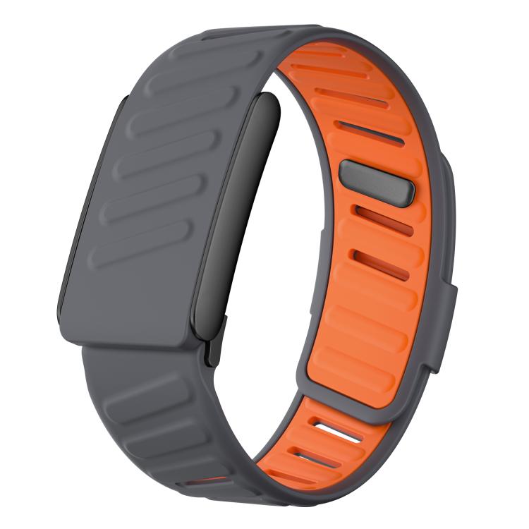 WHOOP 5.0 silicone watch band with a charcoal outer strap and bright orange inner strap