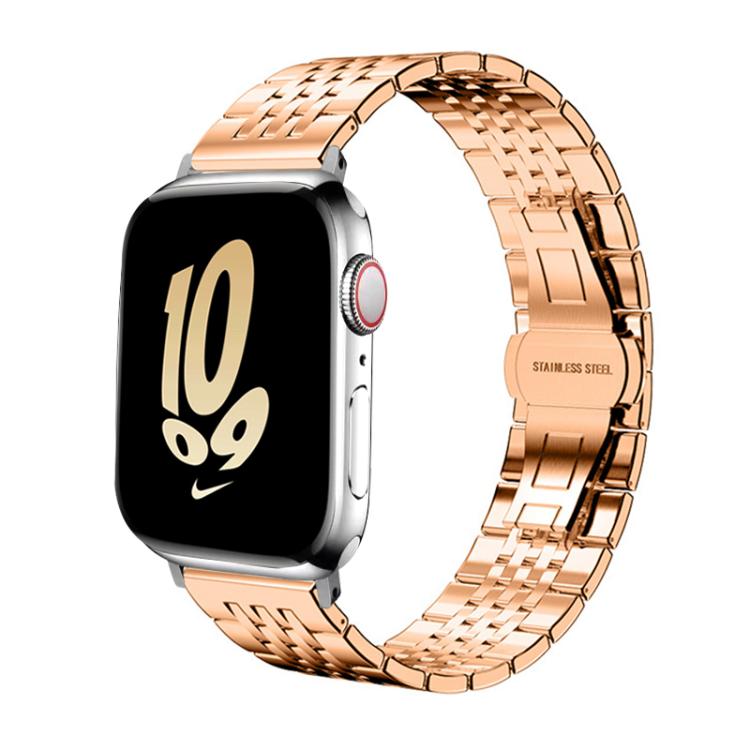 Rose gold stainless steel seven-bead Apple Watch band shown attached to a watch