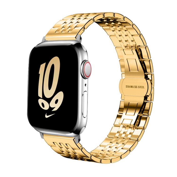 Gold stainless steel seven-bead Apple Watch band shown attached to a watch
