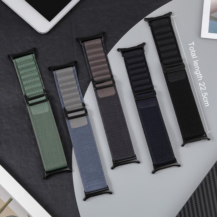 Five nylon watch bands in green, blue-gray, brown, navy and black, shown flat