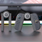 Nintendo Switch 2 charging handle grips, two controllers standing on base