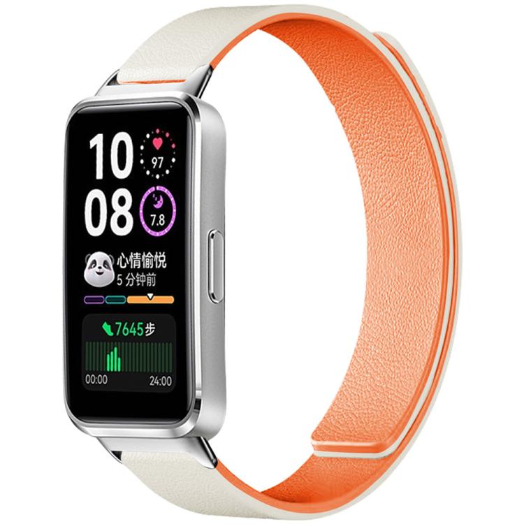 Magnetic silicone watch band with cream exterior and orange lining, shown attached to a smartwatch.