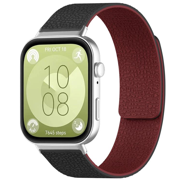 Textured silicone watch band in black and burgundy, shown fitted to a smartwatch.