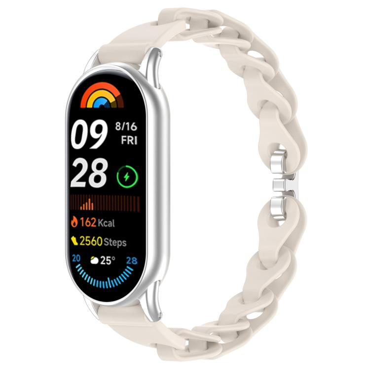 Off-white hollow-link silicone watch band fitted to a smartwatch.