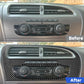 Black carbon-fiber center console trim showing air vent surround and climate control