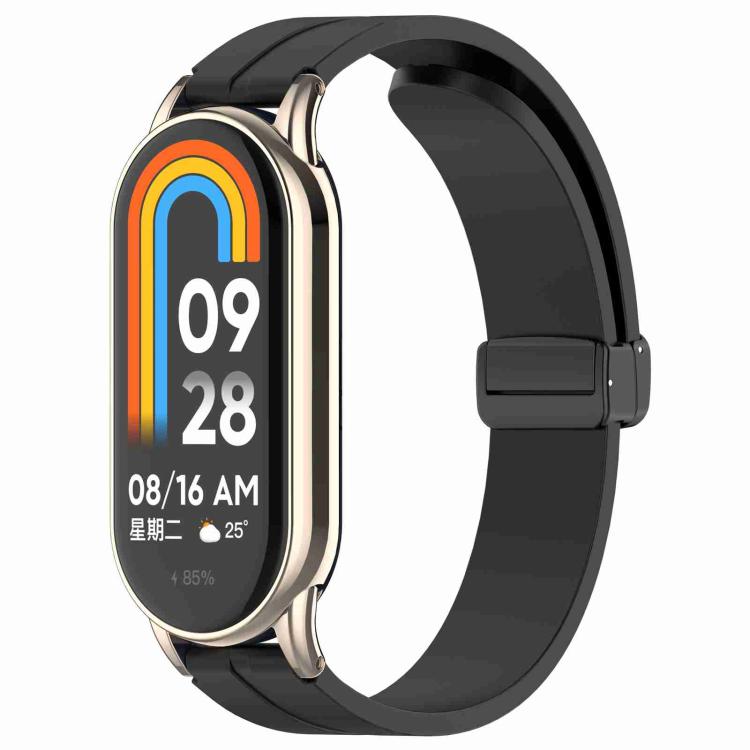Black silicone watch band with folding buckle, shown attached to a smartwatch