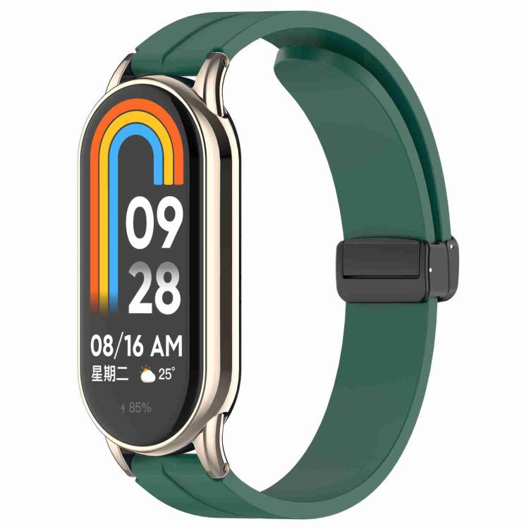 Pine green silicone watch band with folding buckle, shown attached to a smartwatch