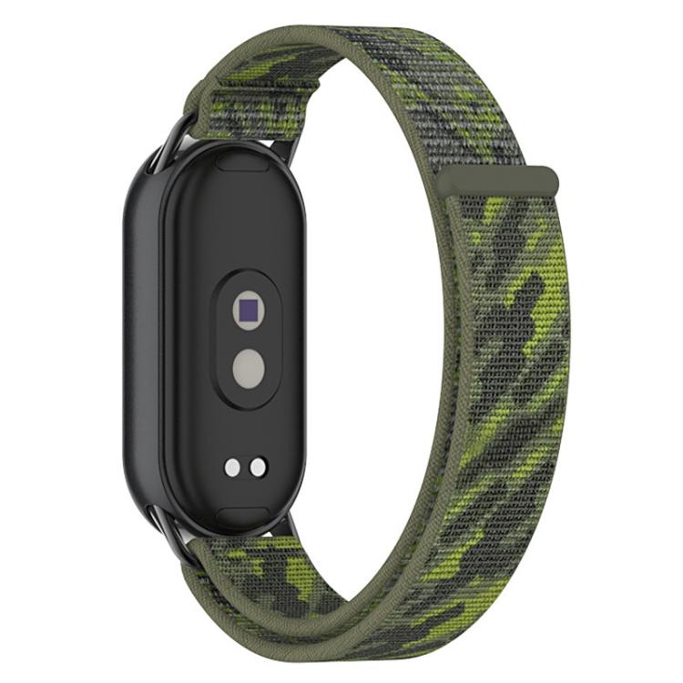Camouflage green nylon loop watch band with black fitness tracker module