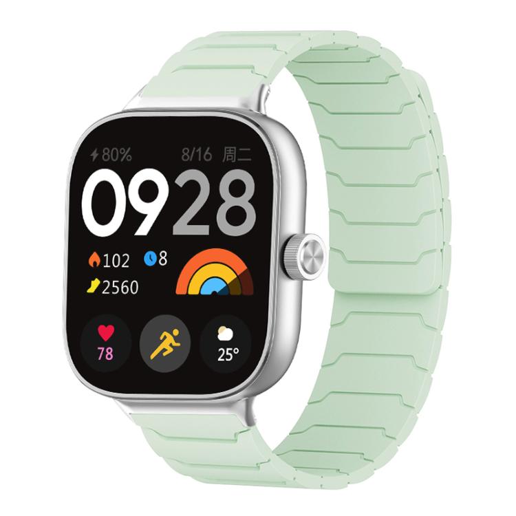 Mint green magnetic silicone watch band with segmented links, shown on a smartwatch.