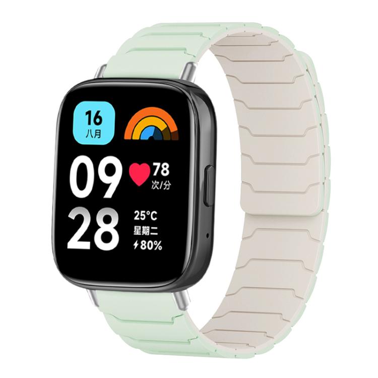 Magnetic silicone watch band in mint green with a cream inner surface