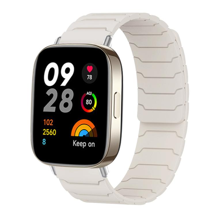 Light gray magnetic silicone watch band fitted to a rectangular smartwatch