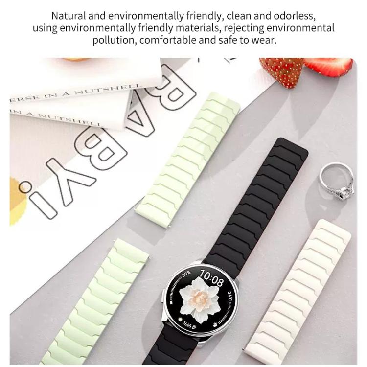Magnetic silicone watch bands in pale green, black, and light gray shown with a round smartwatch