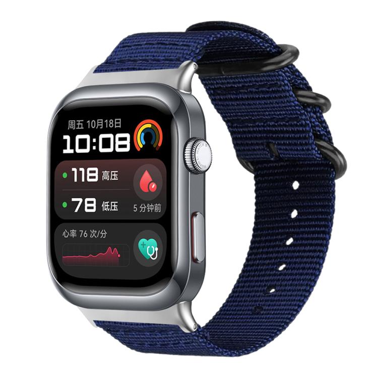 Midnight blue nylon canvas watch band with black ring buckle on a silver smartwatch with dark display