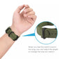 xDfind green woven nylon watch band worn on a wrist, with adjustable buckle detail