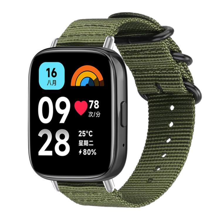 Army green nylon canvas watch band with black ring buckle on a rectangular watch