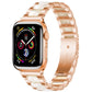 Rose gold metal Apple Watch band with white resin links