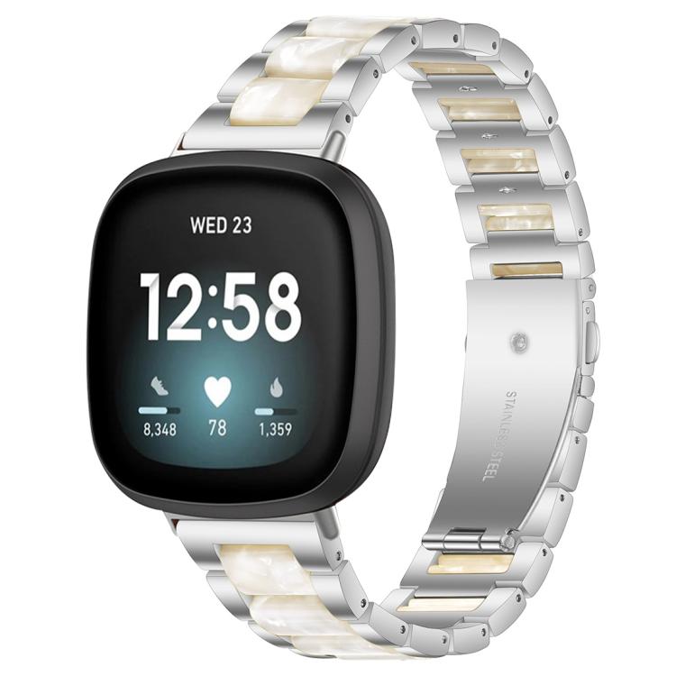 xDfind silver metal and resin watch band with pearly white links, shown on a smartwatch