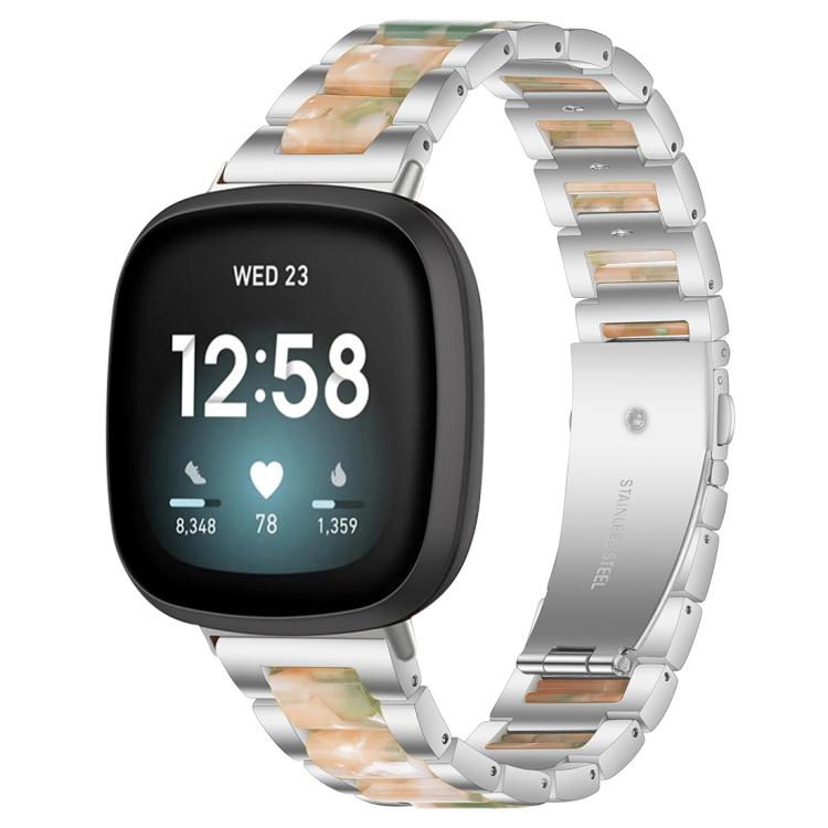 xDfind silver metal and resin watch band with green and peach links, shown on a smartwatch