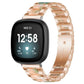 xDfind rose gold metal and resin watch band with green and peach links, shown on a smartwatch