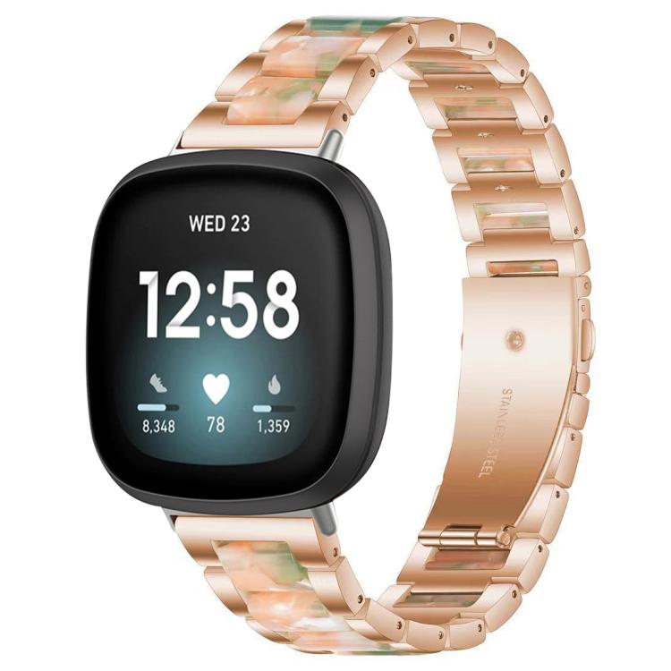 xDfind rose gold metal and resin watch band with green and peach links, shown on a smartwatch