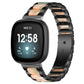 Black metal watch band with peach and green resin inlays, shown on a smartwatch
