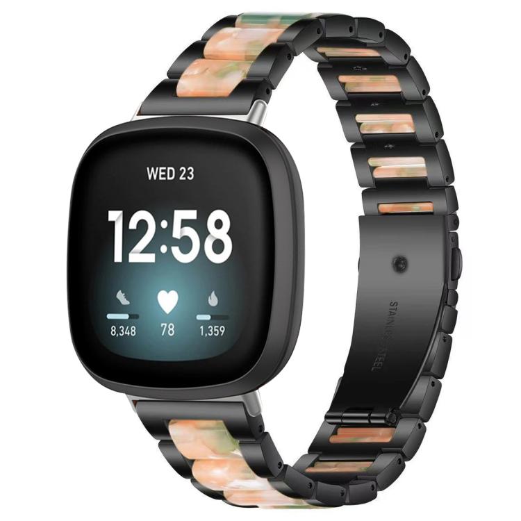 Black metal watch band with peach and green resin inlays, shown on a smartwatch