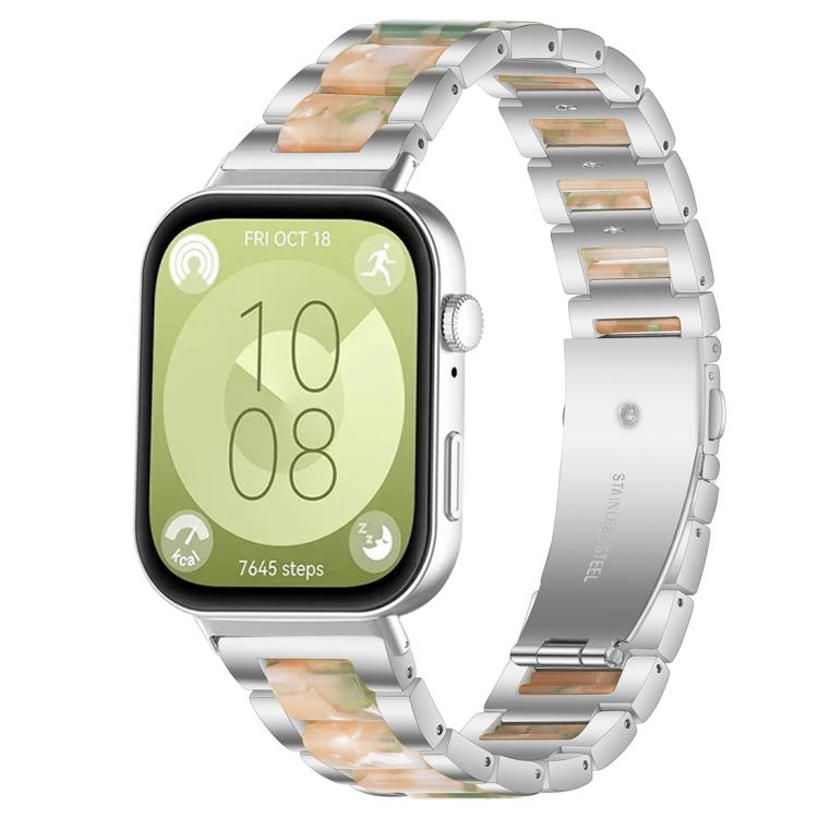 Silver metal watch band with green and peach resin links and three-bead accents