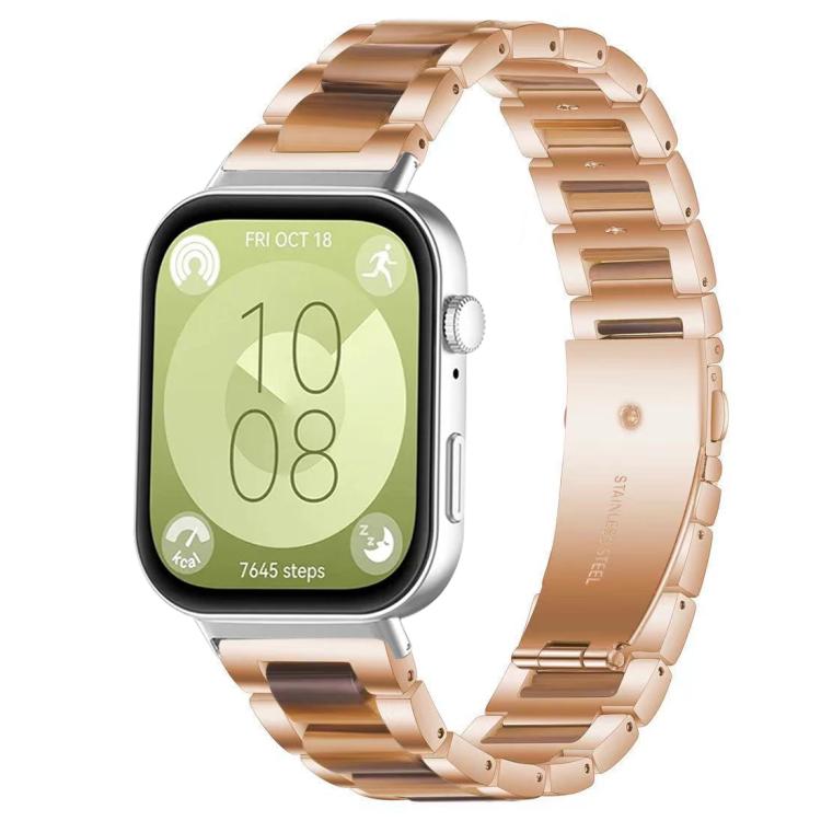 Rose gold metal watch band with brown resin links and three-bead accents