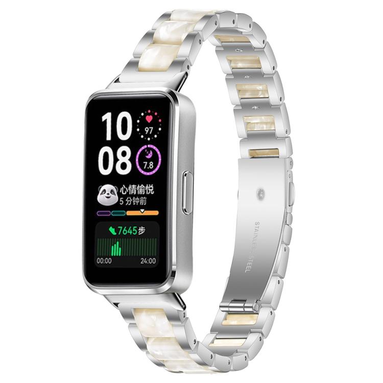 Silver metal watch band with white and cream resin links, shown on a smartwatch.