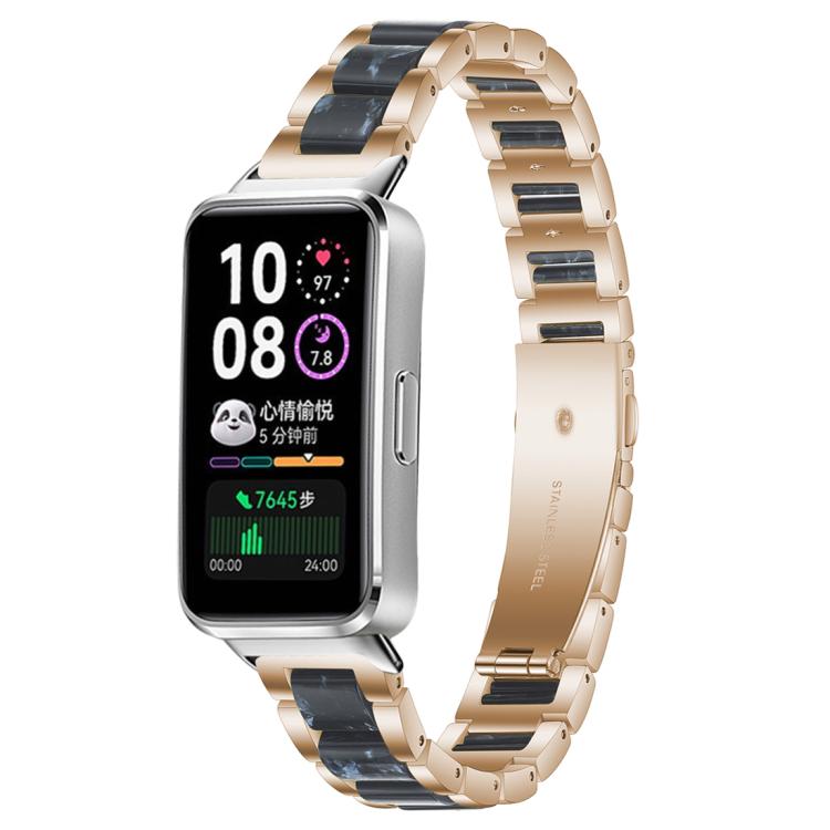 Rose gold metal watch band with dark blue resin links, shown on a smartwatch.