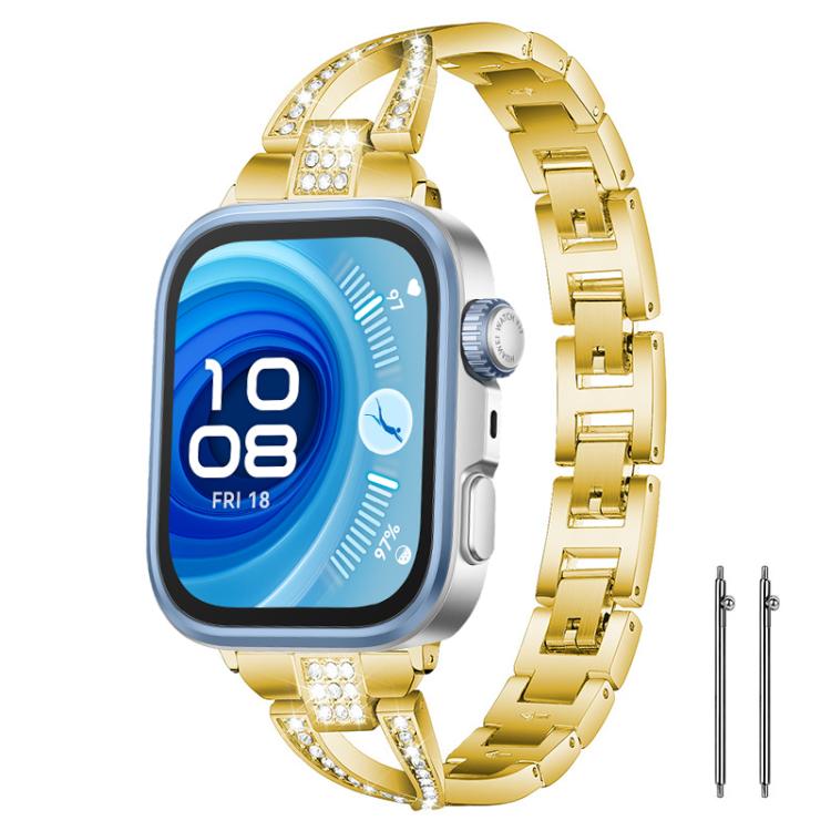 Gold-tone metal watch band with crystal-studded X-shaped connectors, shown on a smartwatch.