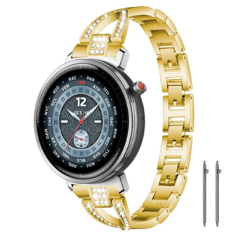 Gold X-shaped metal watch band with crystal accents, shown on a round watch