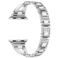 Silver X-shaped metal Apple Watch band with crystal-set edges and linked bracelet