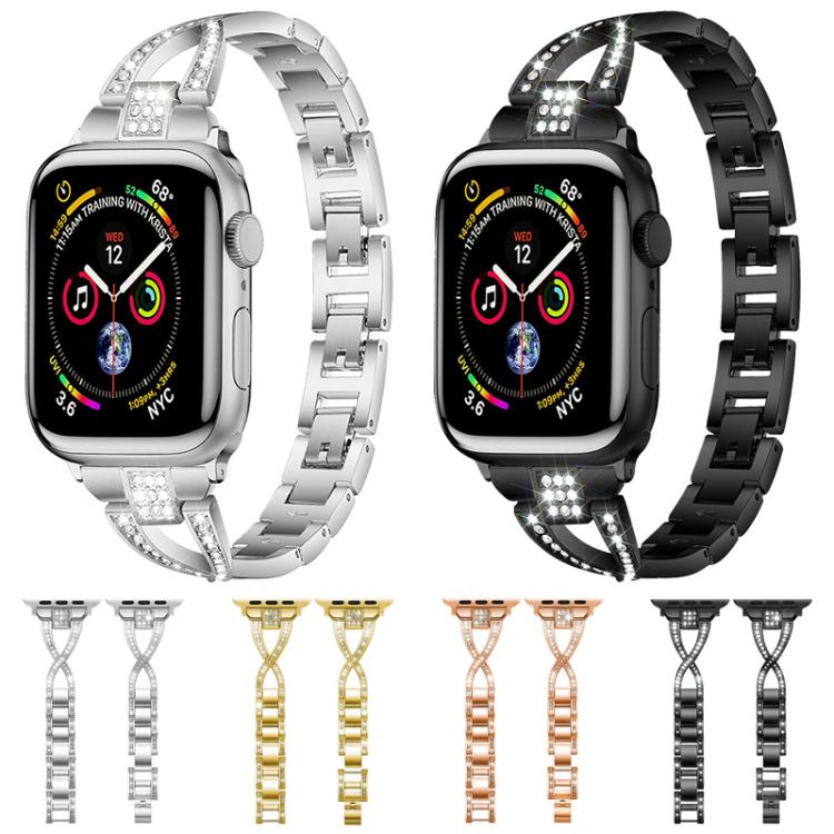 Four metal Apple Watch bands in silver, black, gold, and rose gold with crystal accents