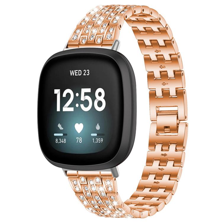 Rose gold five-bead metal watch band with clear stones, shown attached to a smartwatch.