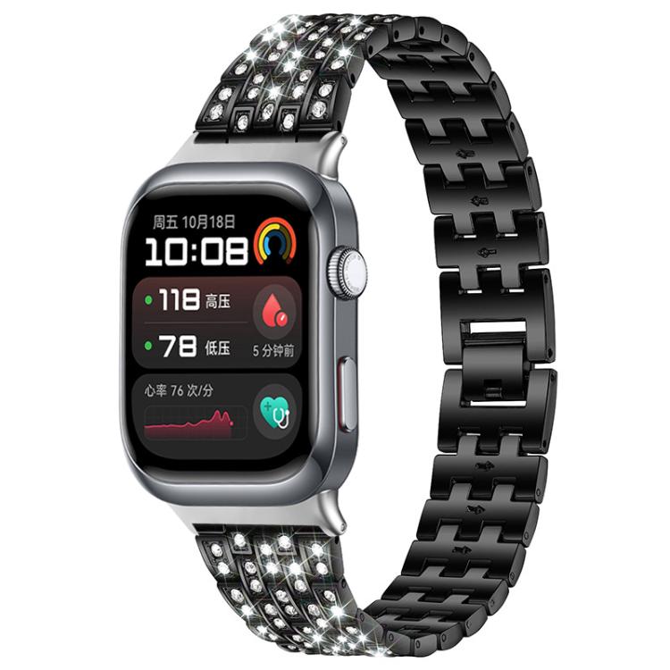 Black metal smartwatch band with five rows of clear stones, shown attached to a watch.