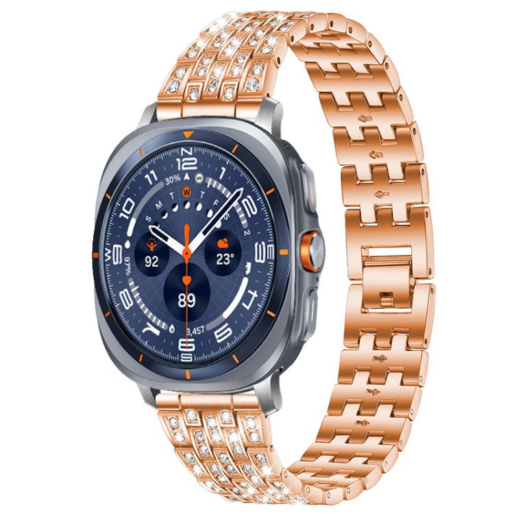 Rose gold five-row metal watch band with clear stones, shown on a smartwatch.
