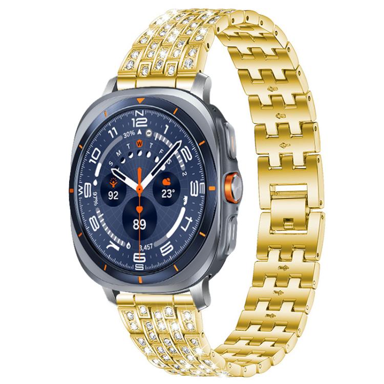 Gold five-row metal watch band with clear stones, shown on a smartwatch.