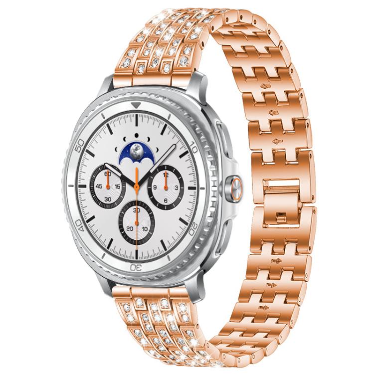 Rose gold five-row metal watch band with clear stones, shown on a smartwatch with a white dial.
