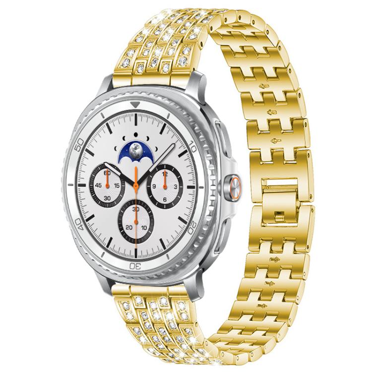 Gold five-row metal watch band with clear stones, shown on a smartwatch with a white dial.