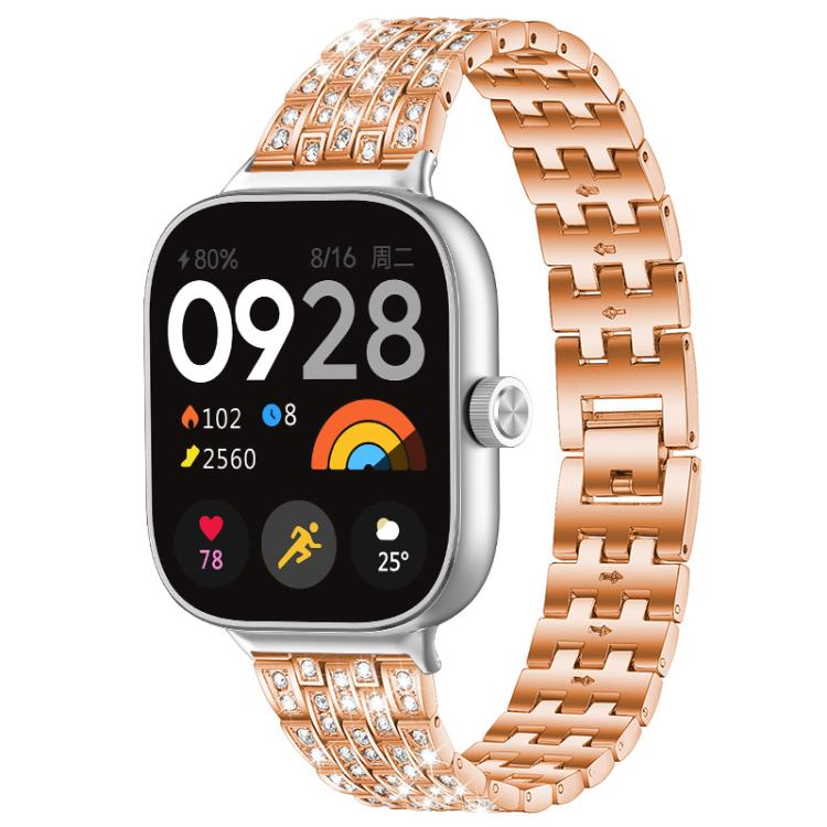 Rose gold metal smartwatch band with rows of clear stones and a linked bracelet.