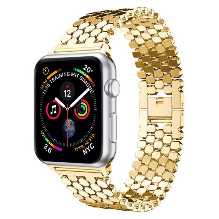 Gold fish scale metal Apple Watch band with clasp, shown attached to a watch