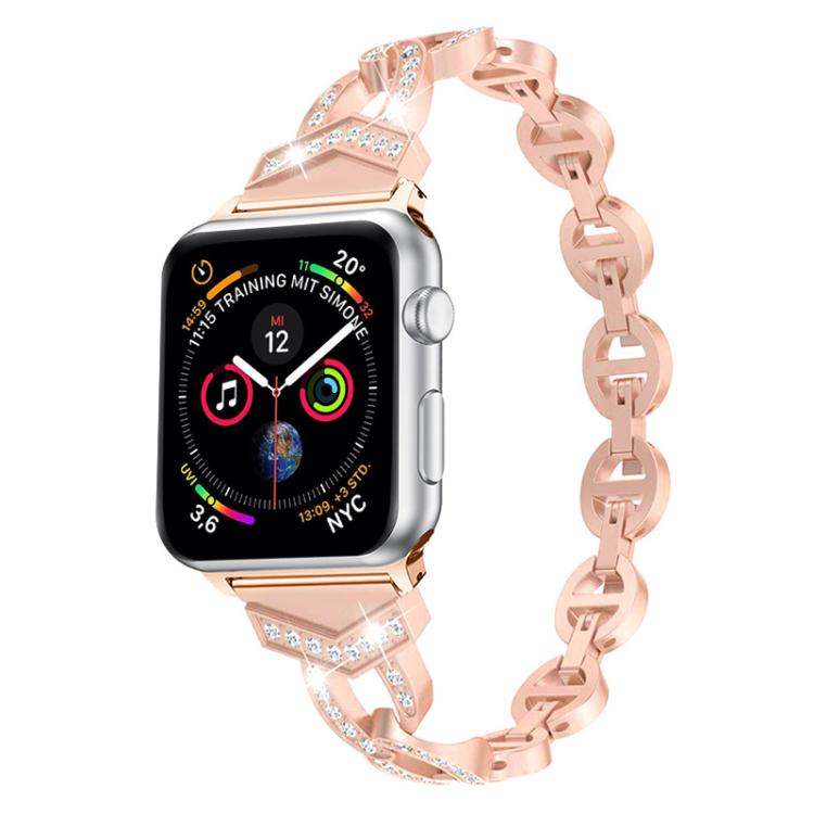 Rose gold crystal-accented stainless steel band attached to an Apple Watch